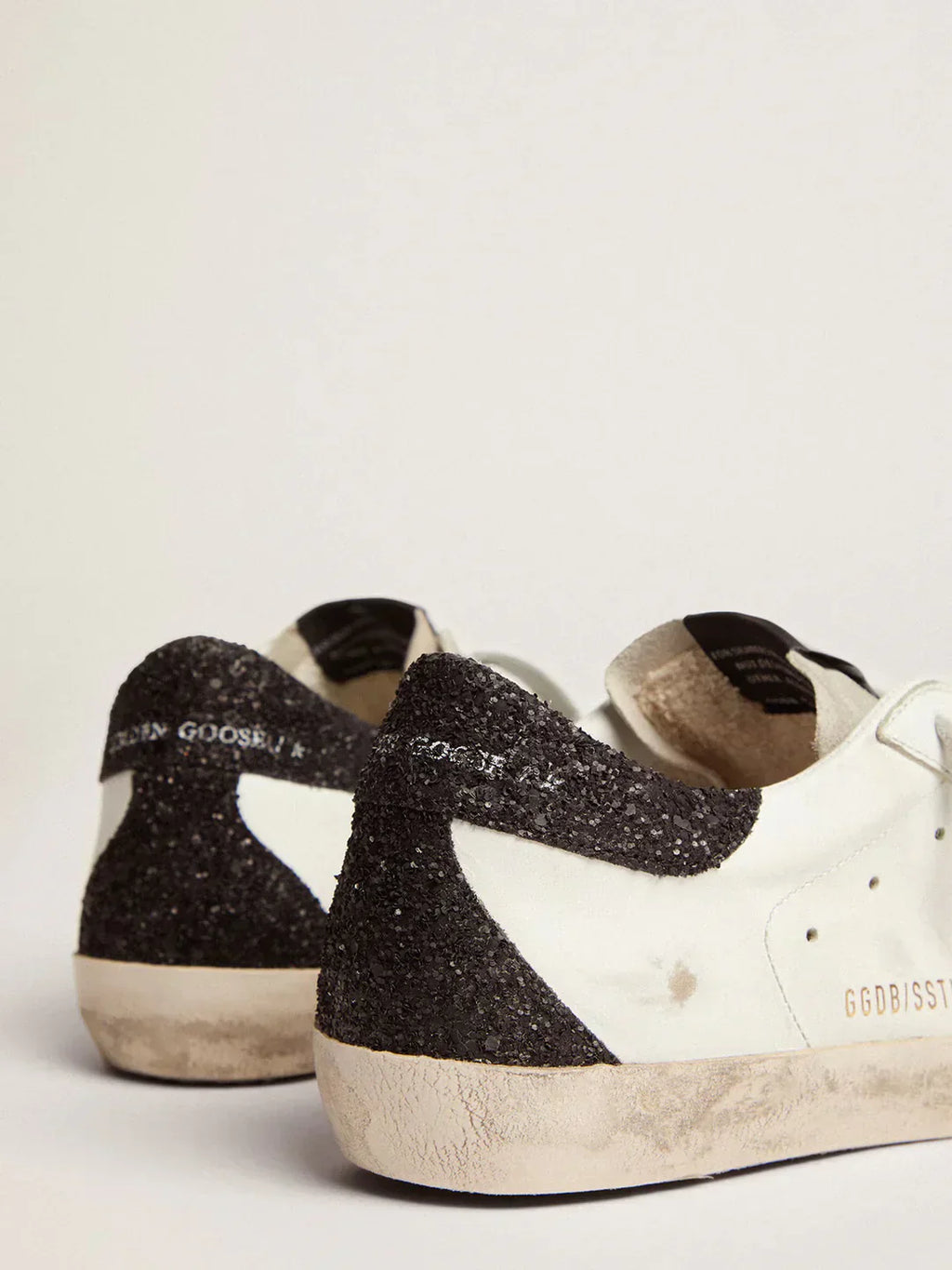 Super-Star femme en cuir nappa avec étoile à paillettes dorées et contrefort à paillettes noires